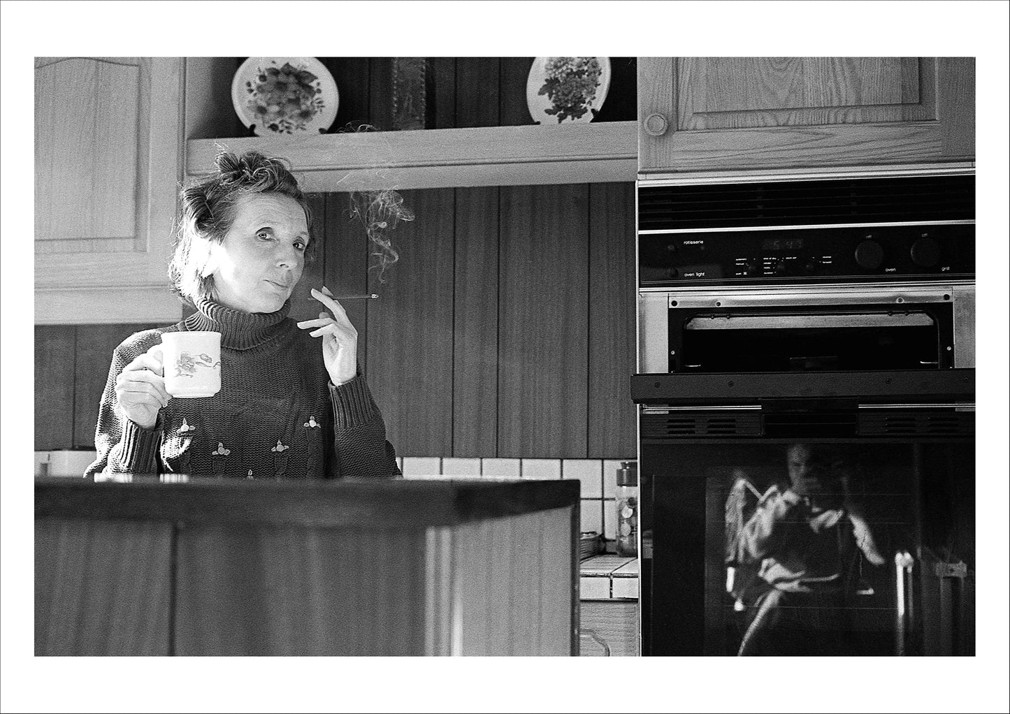 Mother with cigarette and me in the oven, 1991